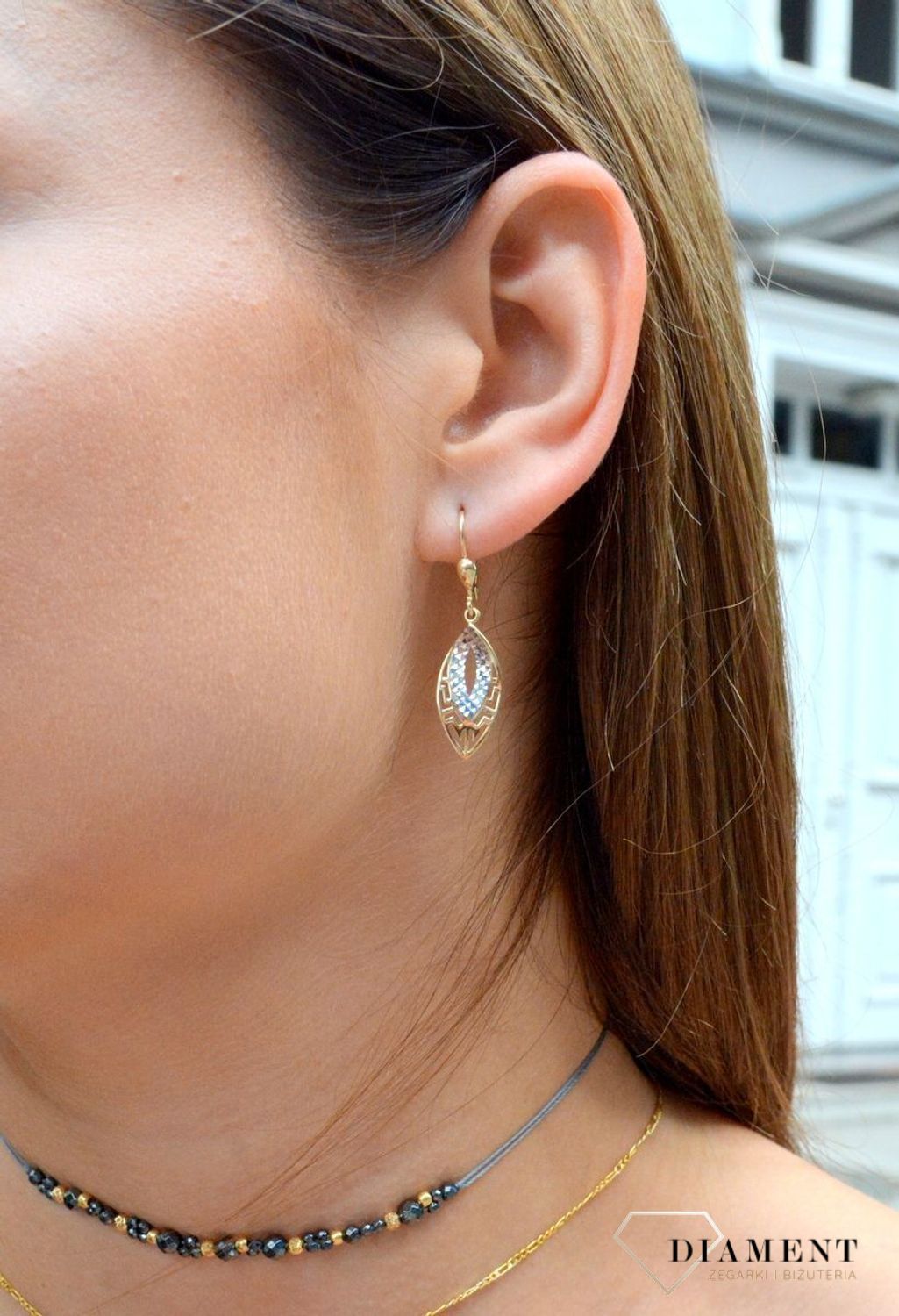 Kolczyki złote pr 333 długie ażurowe z białym złotem KL 5751 333. Od minimalistycznych zdobień po intensywne i nowoczesne formy. Olśniewające kolczyki wykonane z wysokiej jakości 8-karatowego żółtego złota i białego złota, pró.jpg